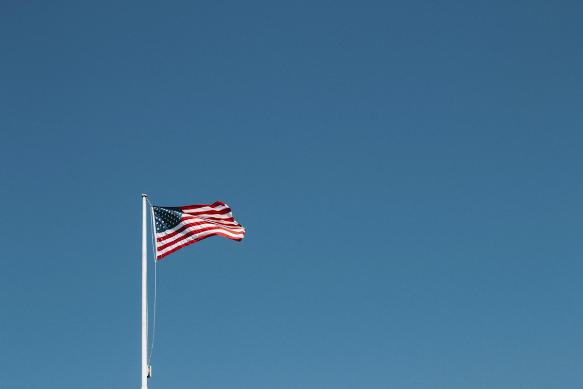 American flag against blue sky