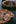 selective focus photography of two pizzas