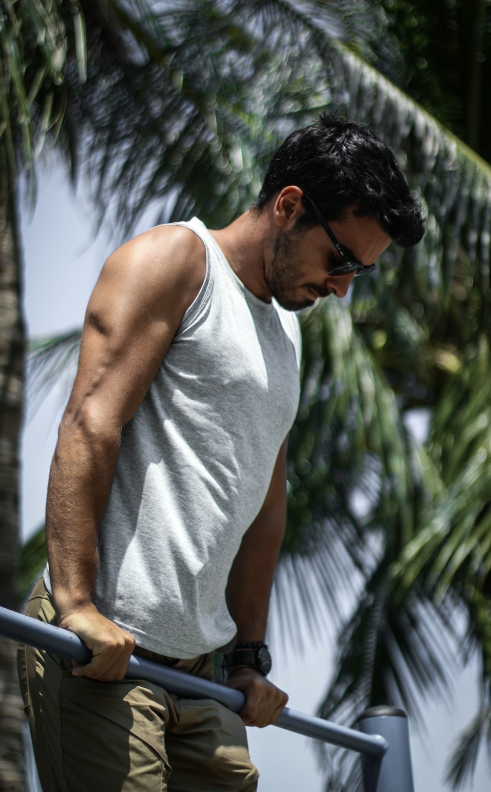 man wearing grey tank top