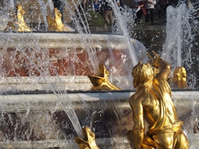 waterfalls with frog statues