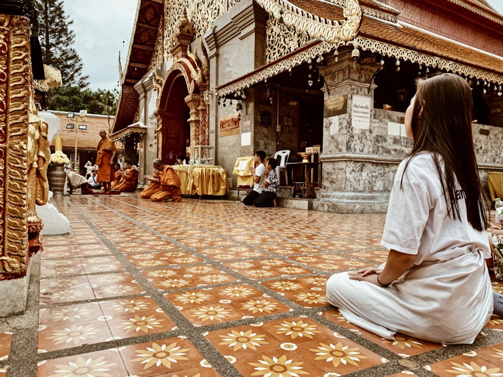 woman sitting on floor