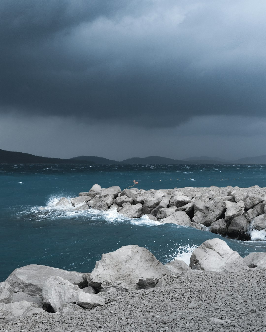 rocks on body of water