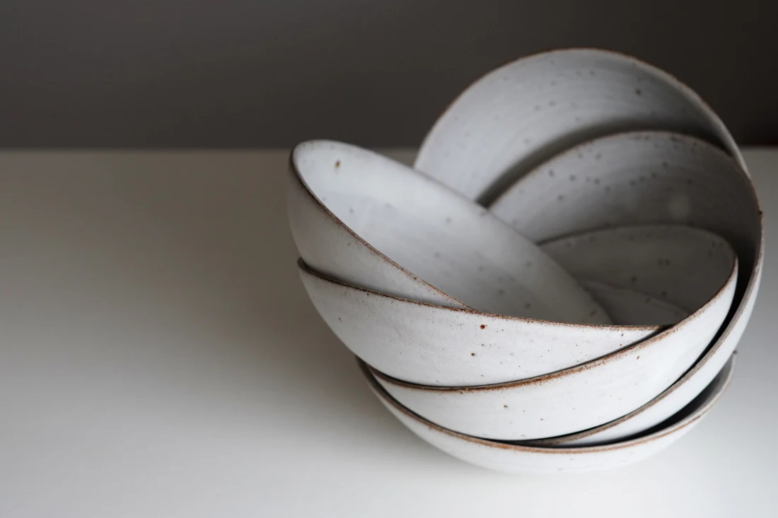 Stacked stoneware bowls photographed as a product