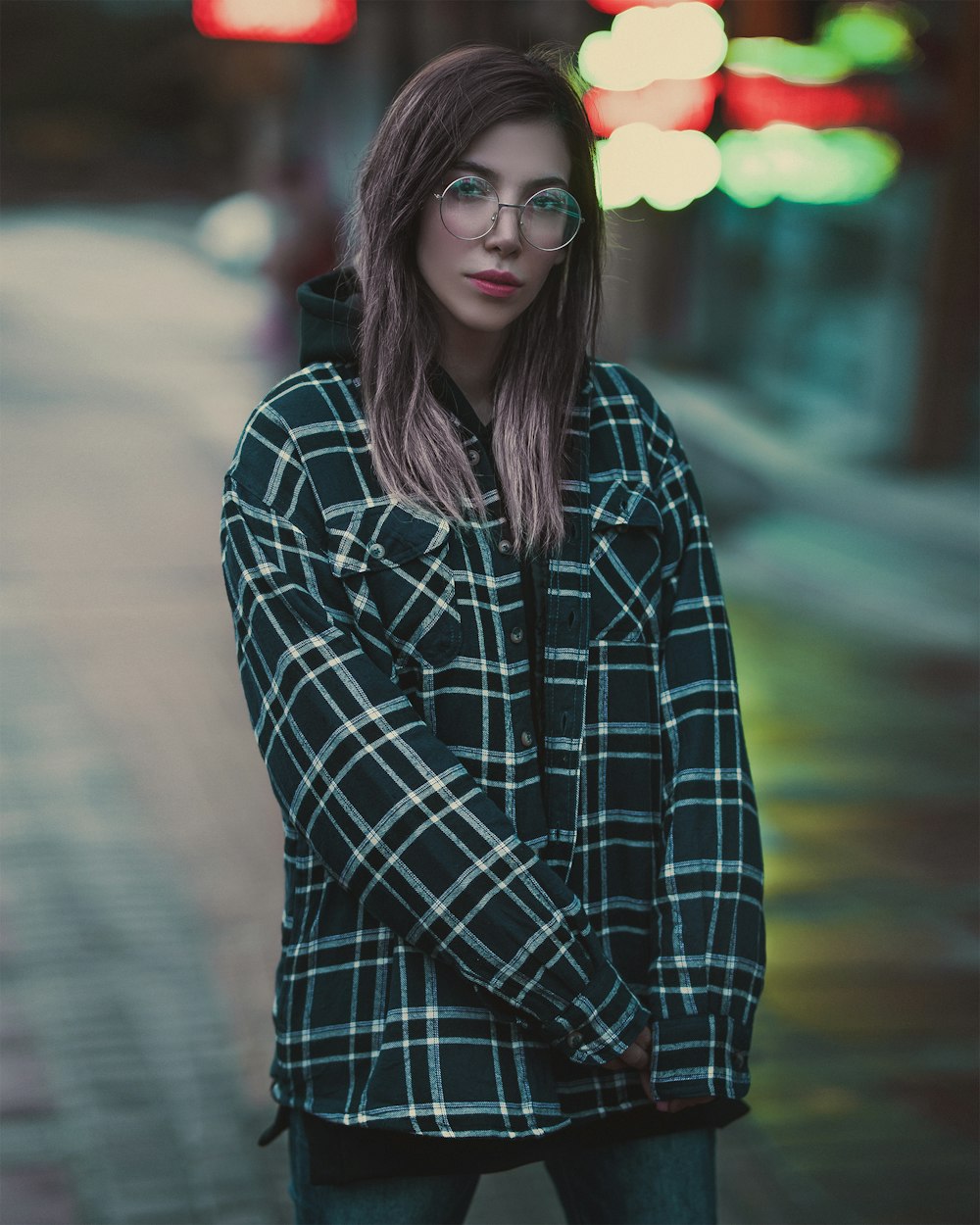 selective focus photography of standing woman wearing jacket