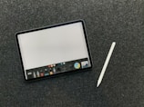 A digital tablet displaying a writing app interface.