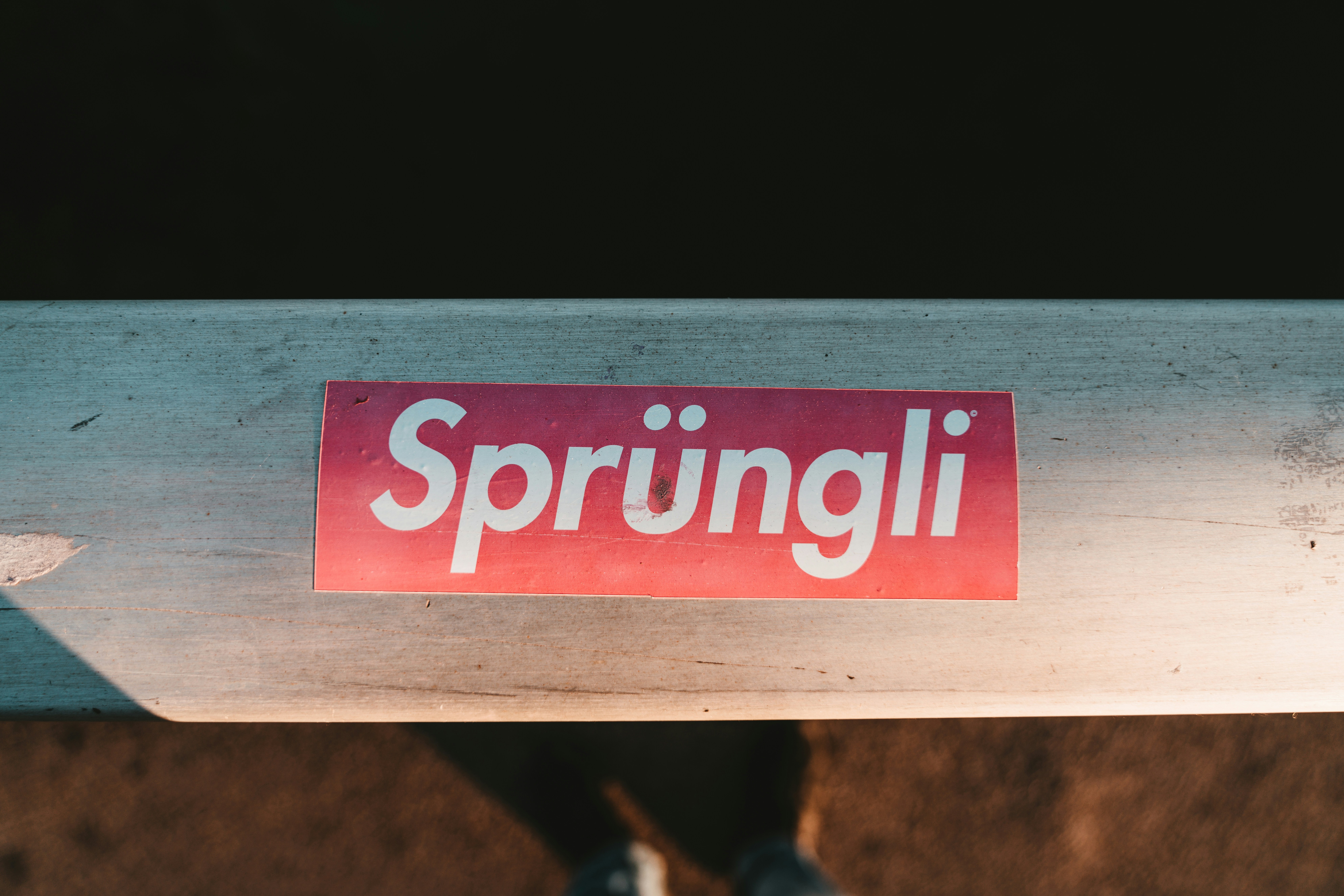 a close up of a sticker on a baseball bat