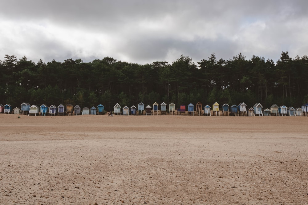 assorted-color wooden sheds during daytime