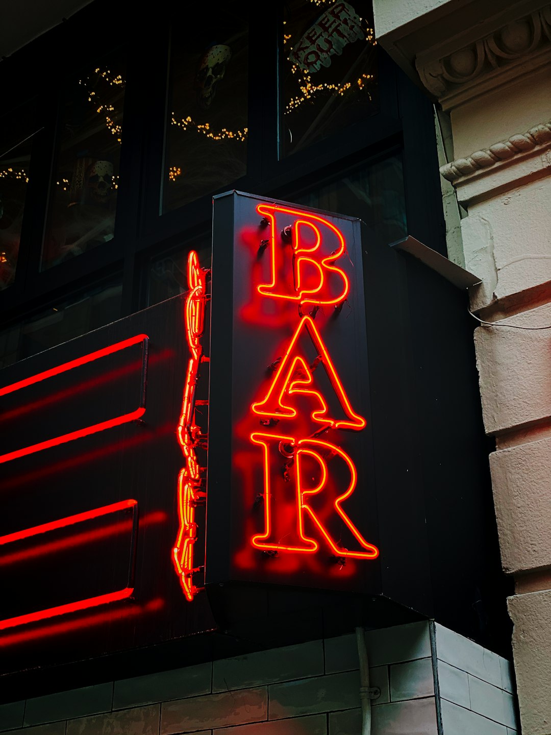 red and black BAR neon sign
