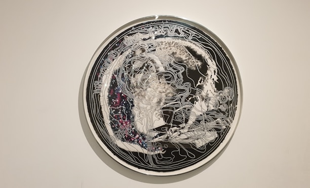 A cosmic-themed illustration showing zodiac signs orbiting around a glowing birth chart.