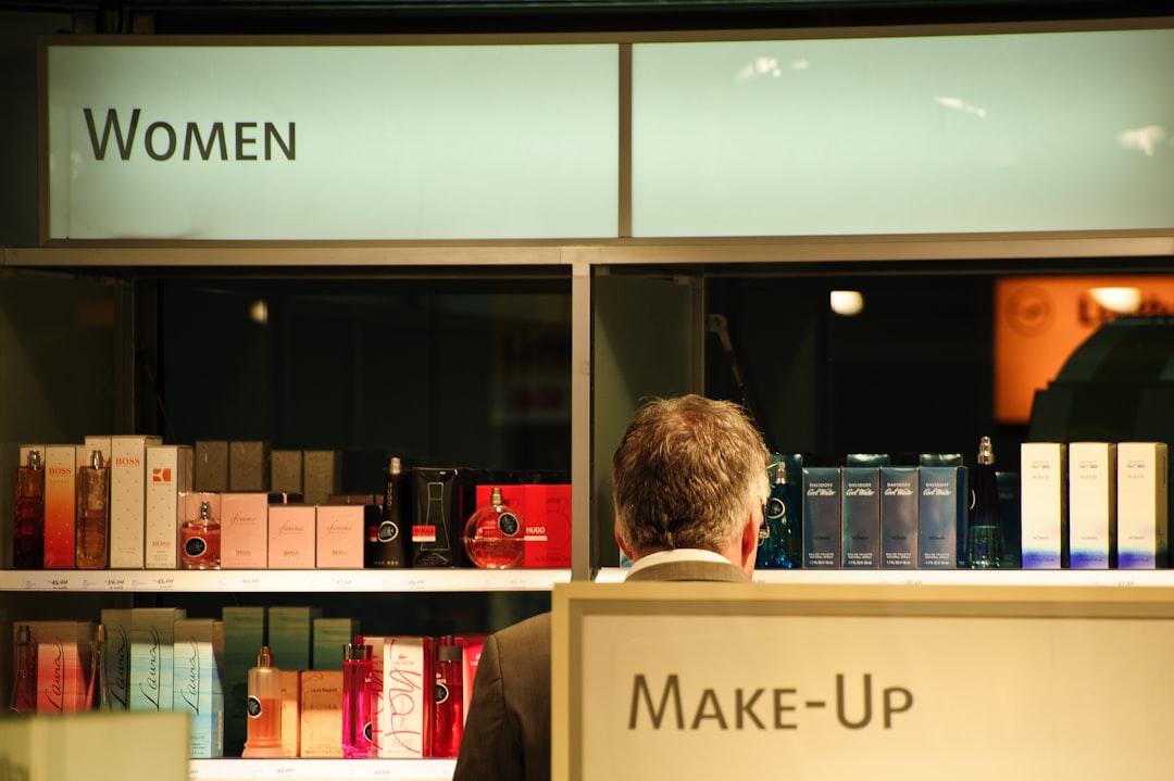 man front of store display