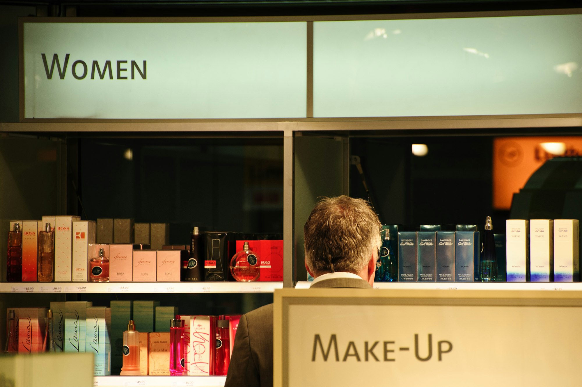 Man shopping at a duty free shop in the airport