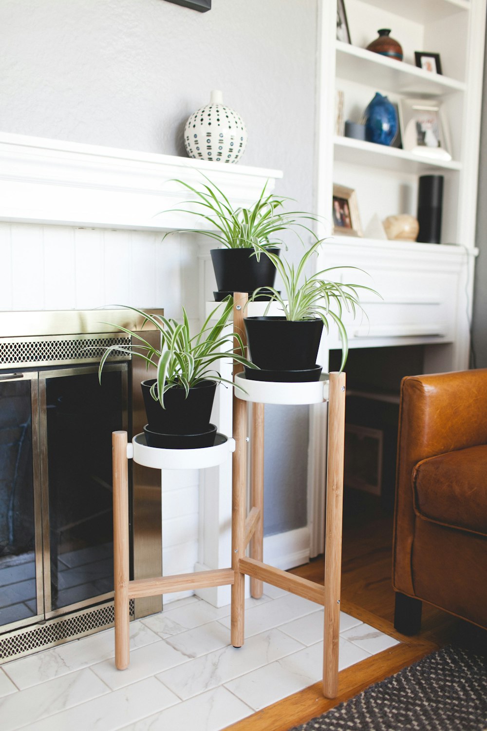 white wooden framed glass top table