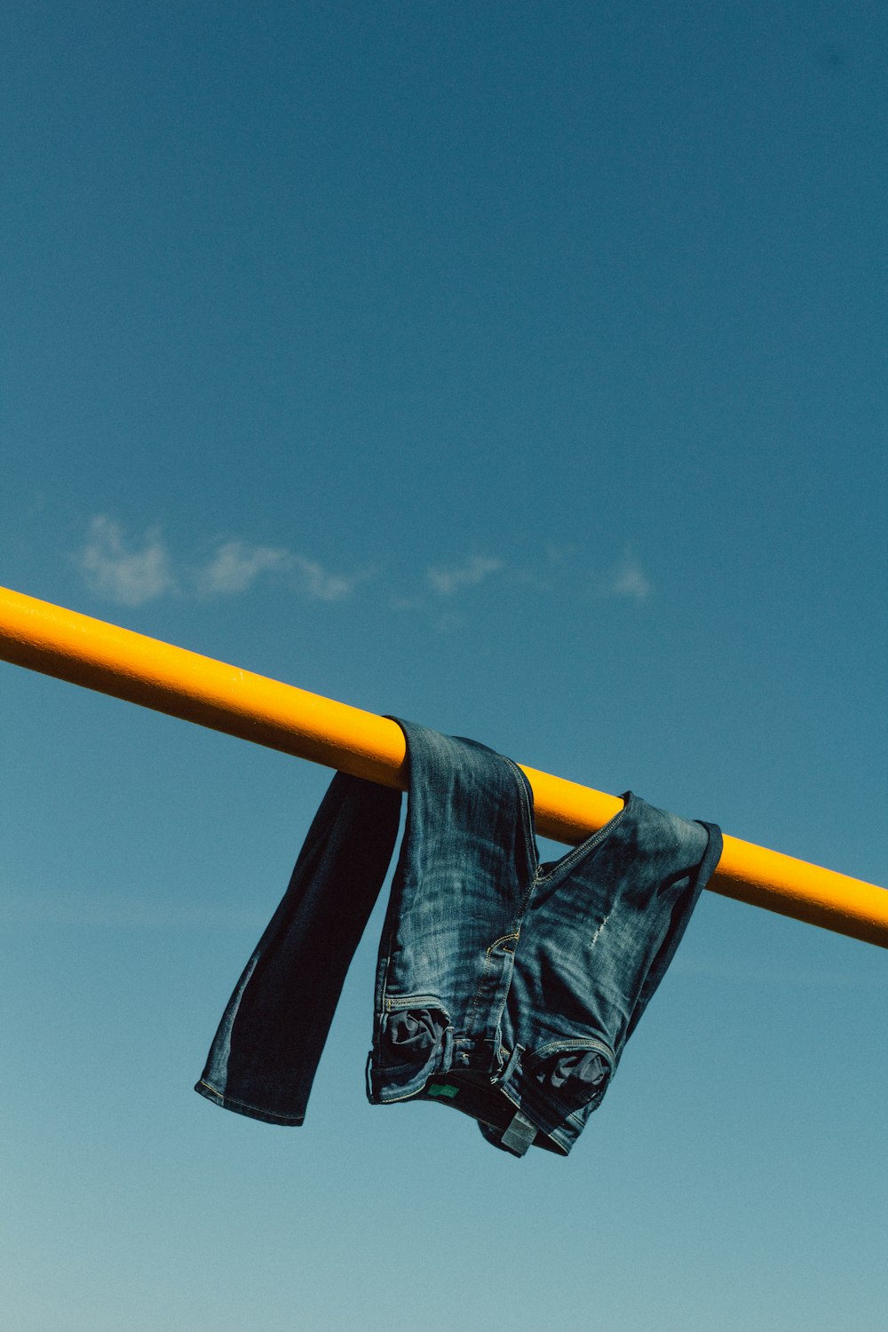 hanged blue denim jeans