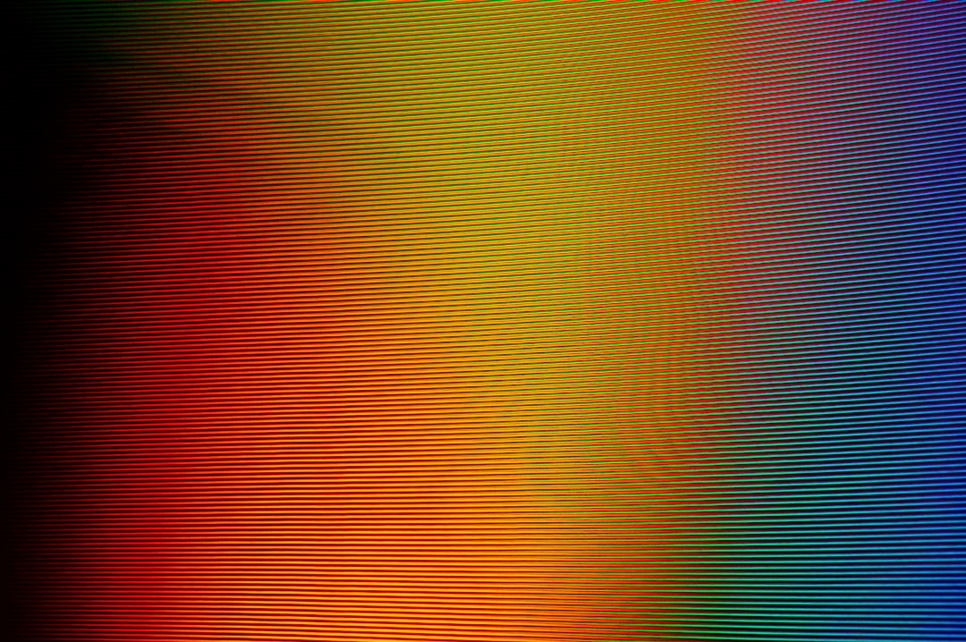 red and multicolored digital wallpaper
