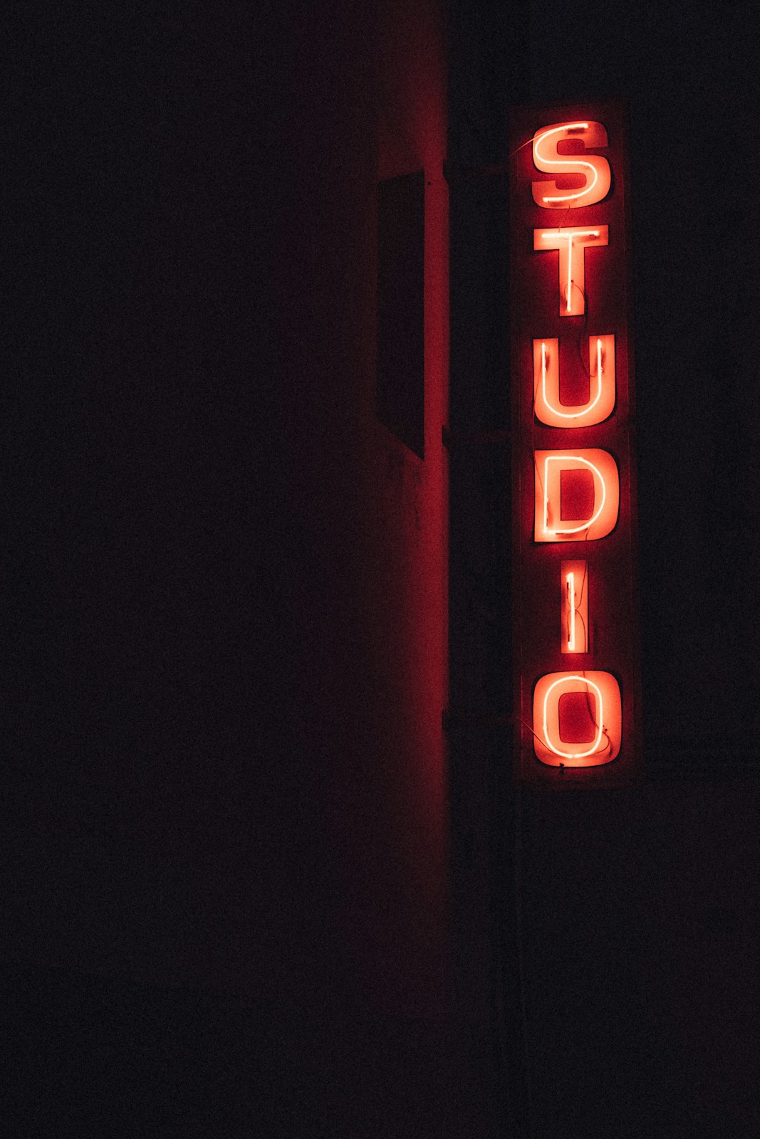 lighted red Studio signage