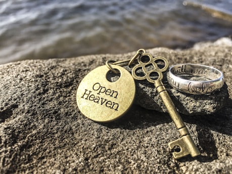gold key on rock