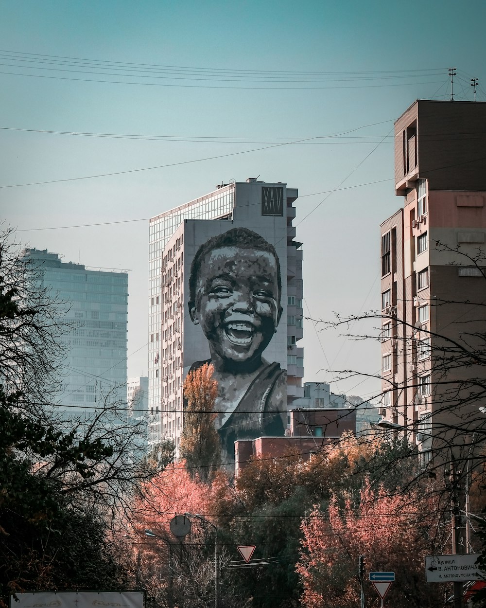 boy face poster on building