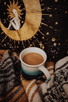 A cozy ceramic mug featuring a colorful, personalized print perfect for morning coffee.