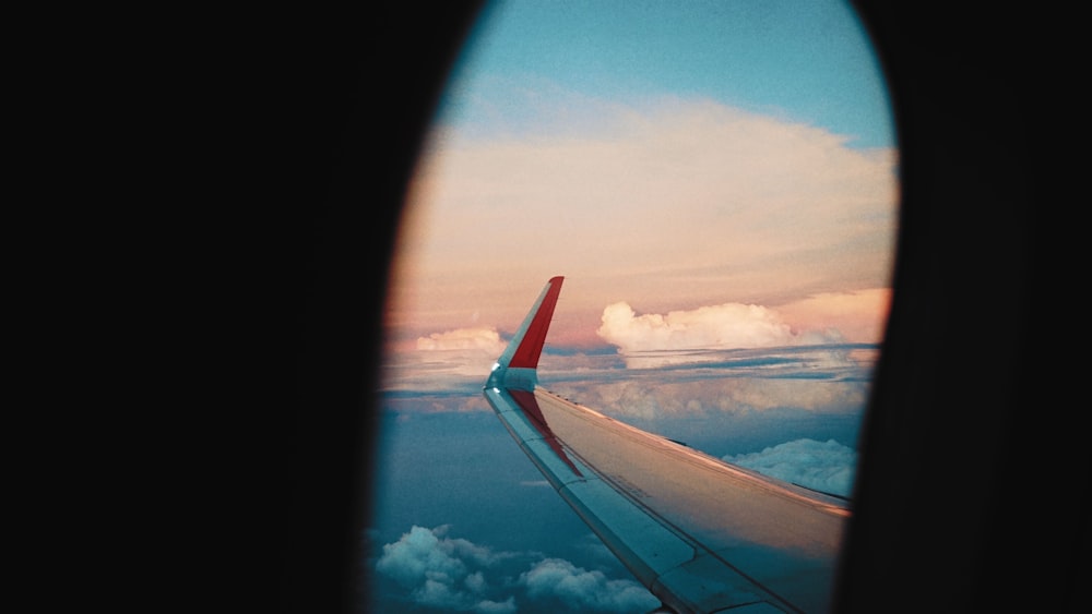 airplane's wing through window