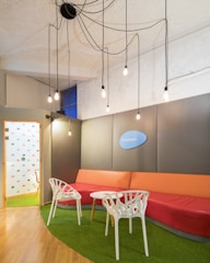 A bright, airy room styled with sack'n gag cushions adding personality to the decor.