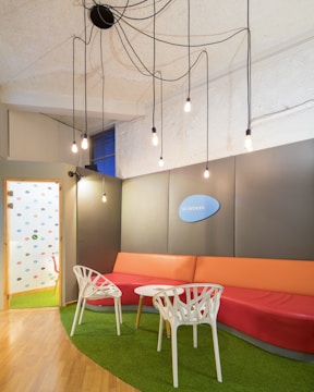 A bright, airy room styled with sack'n gag cushions adding personality to the decor.