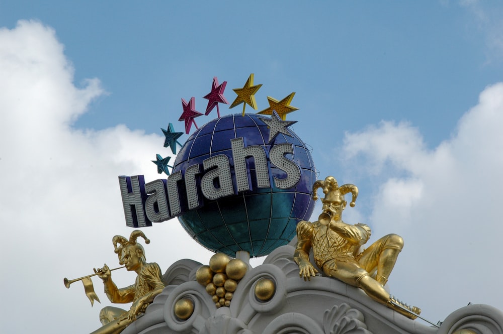 Harrahs globe sign under blue sky