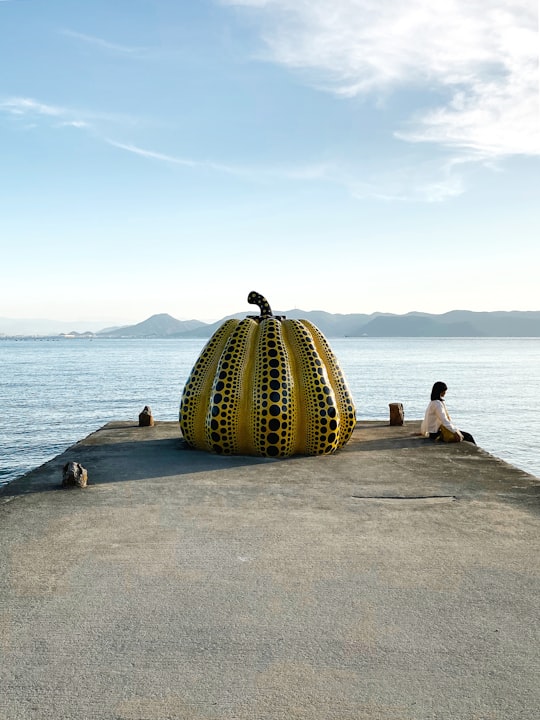 brown and white ceramic table decor in Yayoi Kusama Japan