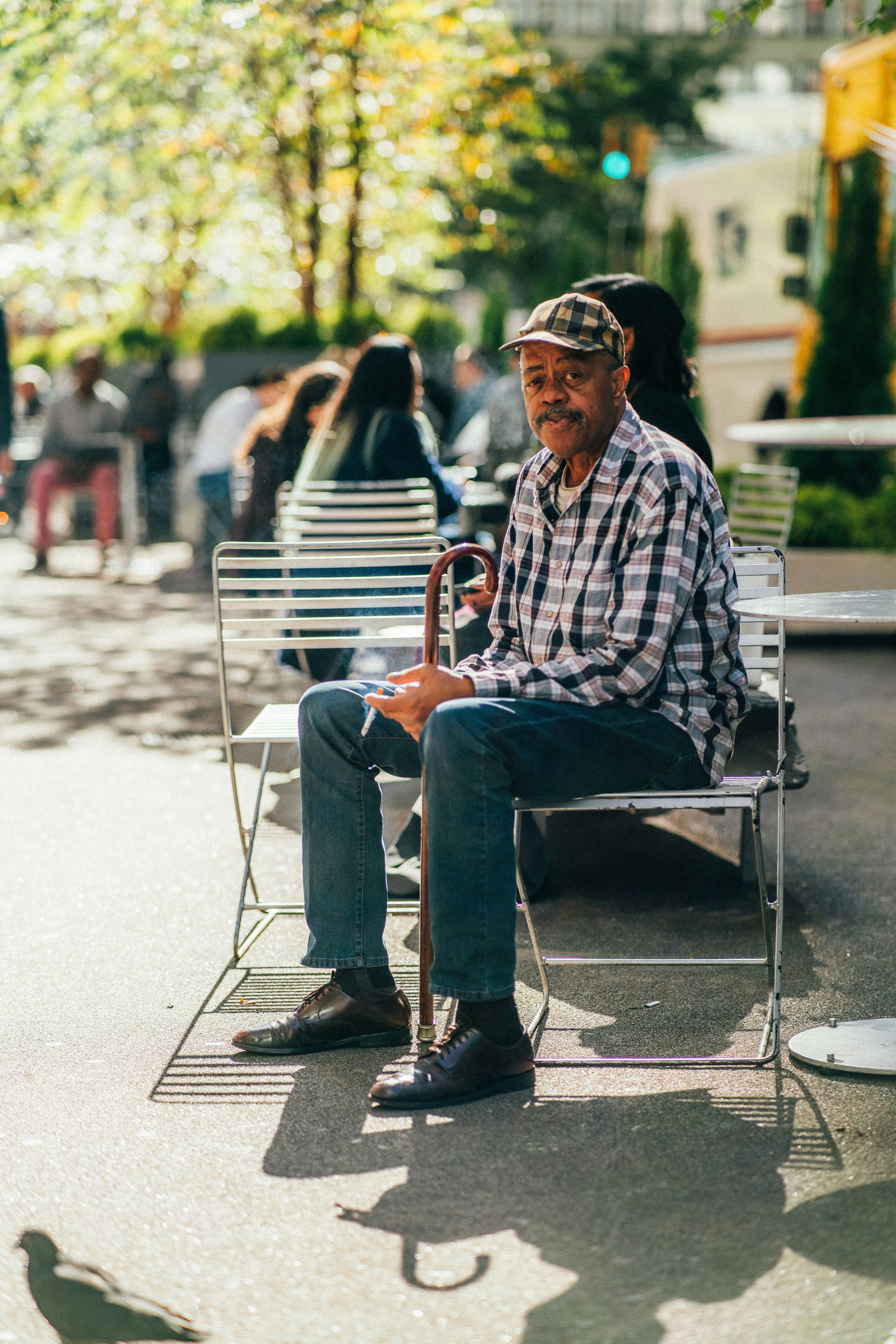 Man sitting on bench photo – Free Person Image on Unsplash