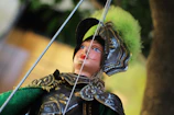 Close-up of an intricately carved 19th-century marionette with golden embellishments