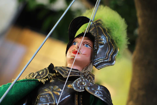 Close-up of an antique marionette with intricate hand-painted details.