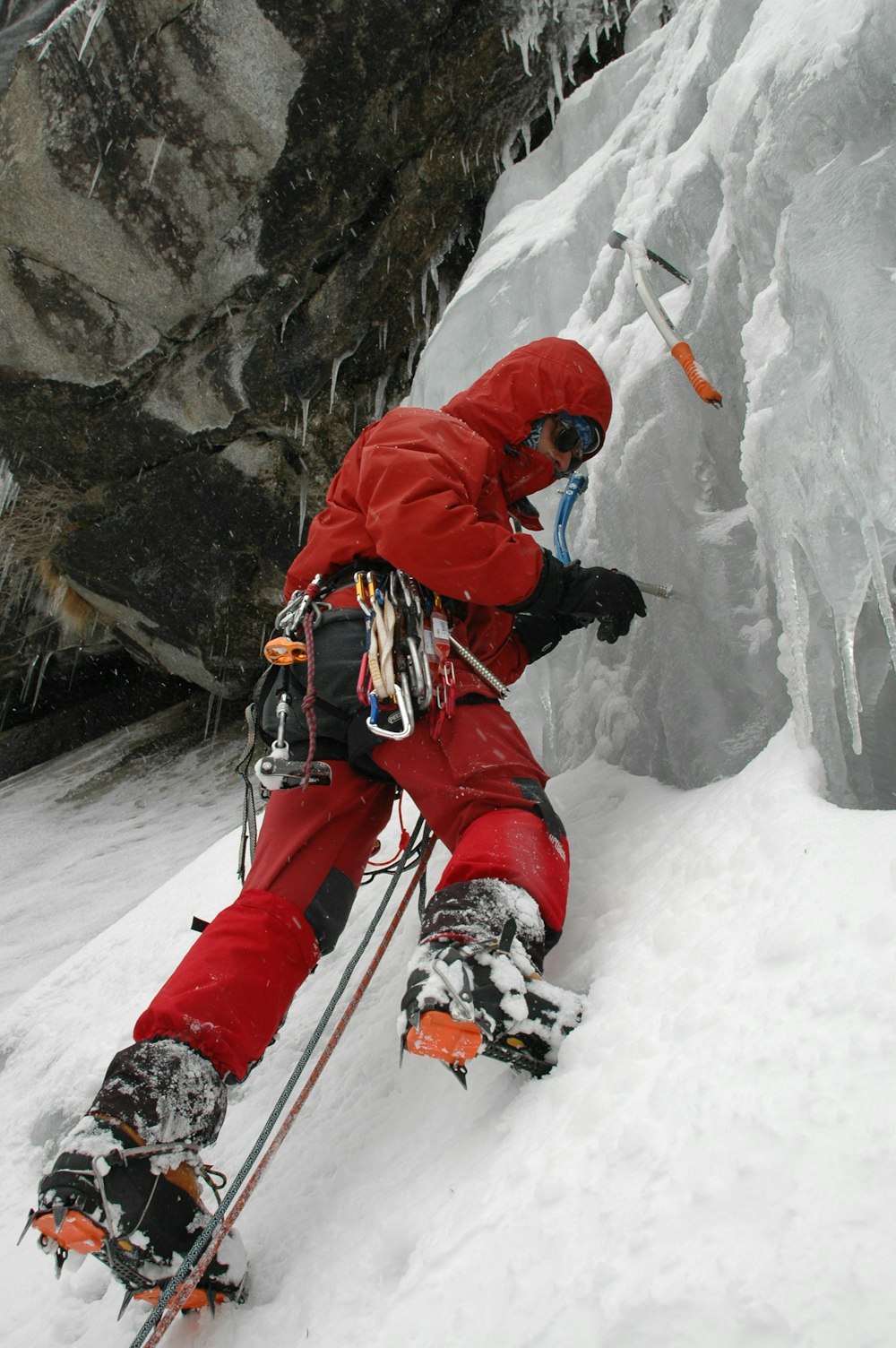 man wearing red jacket and pants