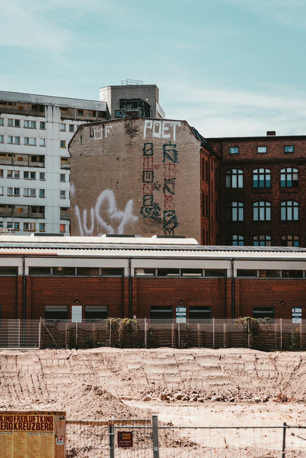 brown buildings under blue sky