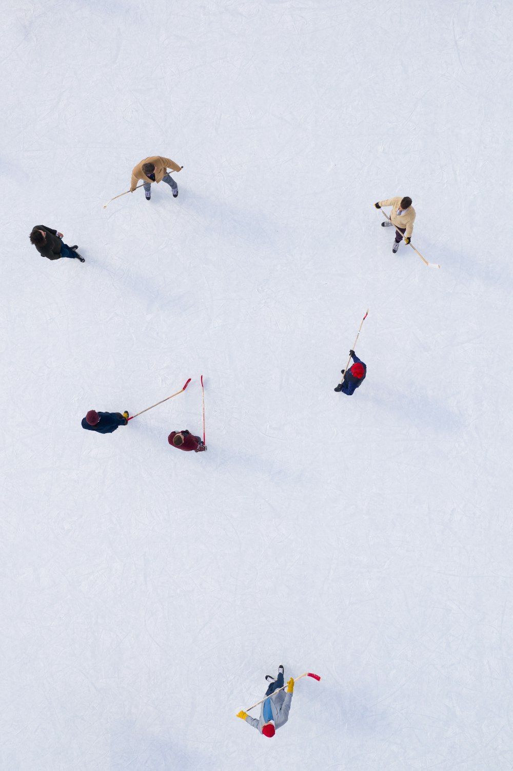 aerial view of people skiing on ice