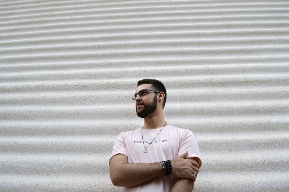 man wearing pink shirt