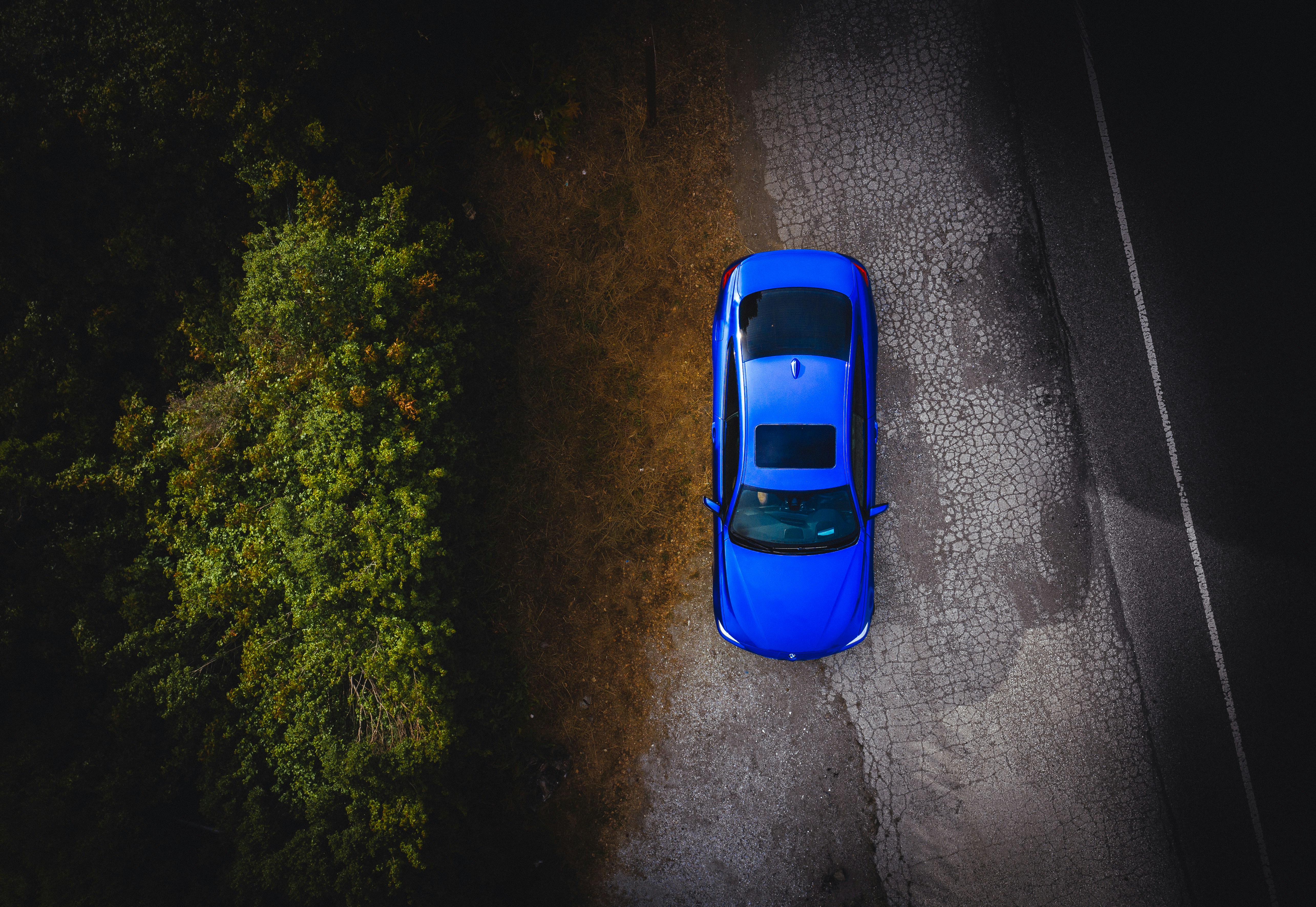 aerial view of blue car