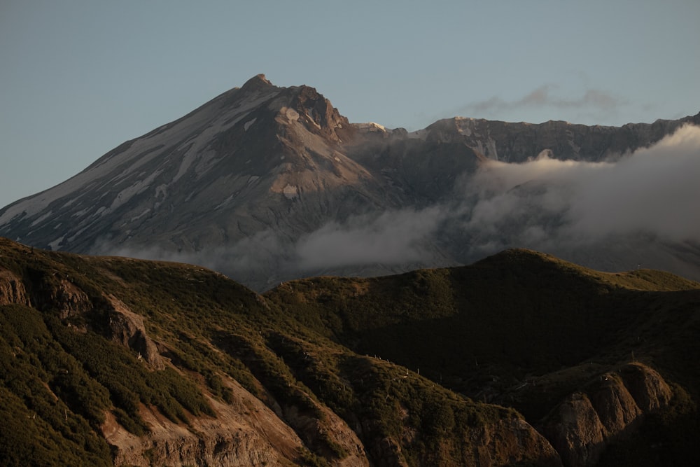 view of mountain under blue sky