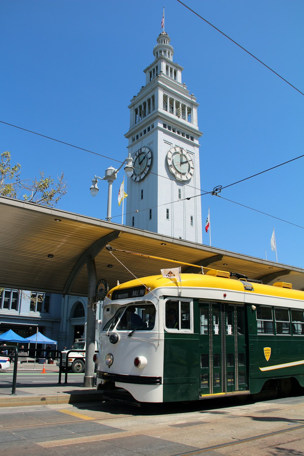 green and white tram