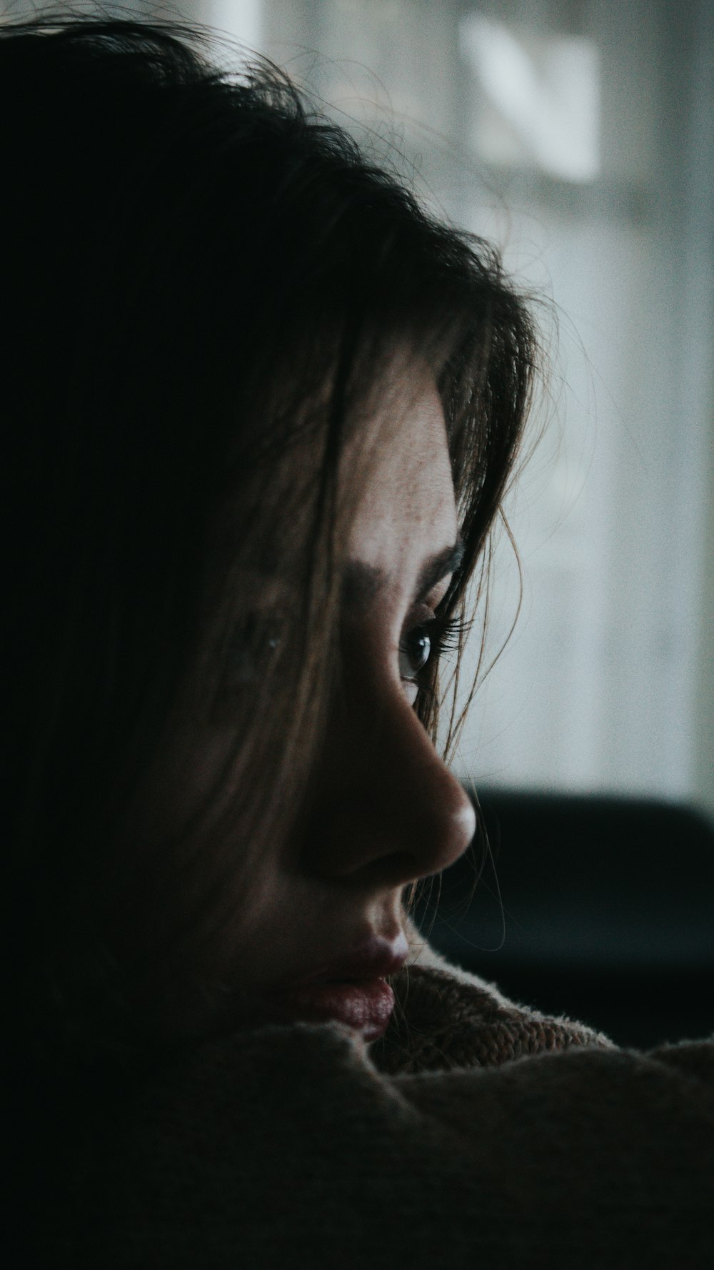 a close up of a person with long hair