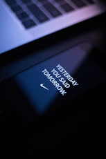 turned-on black smartphone