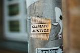 climate justice poster on post