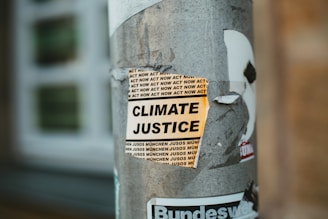 climate justice poster on post