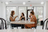 women drinking indoors