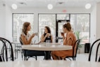 women drinking indoors