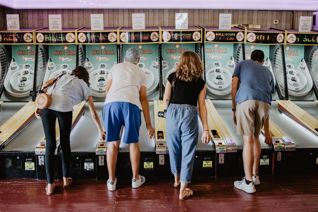 people playing arcade