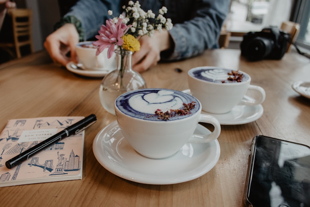 two white ceramic cups