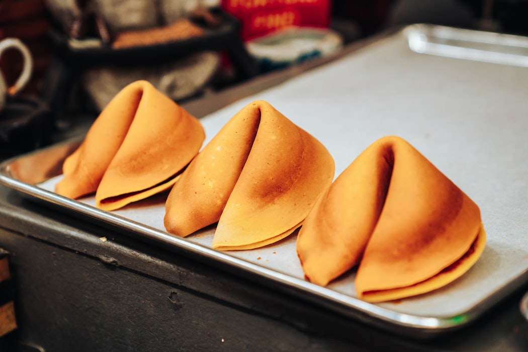 Fortune cookies were actually invented in America, in 1918, by Charles Jung.