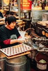woman working on machine