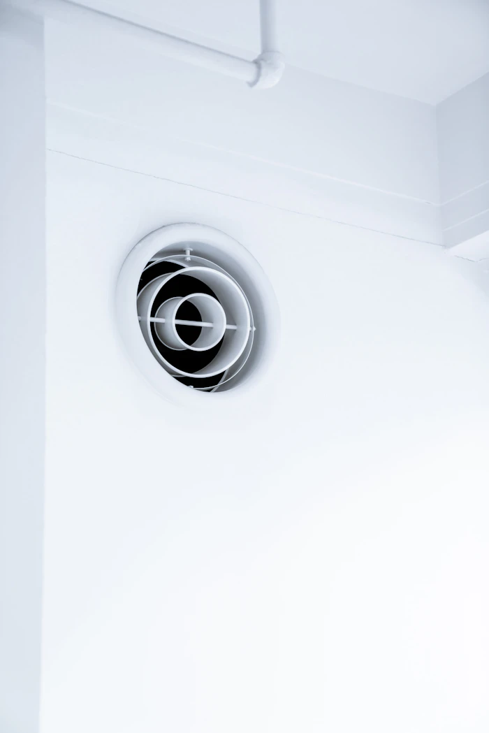 Air vent grille being checked during a duct inspection