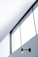 Modern window design installed in a bright living room, highlighting natural light and sleek frames.