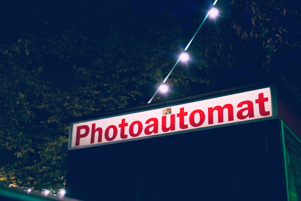 red photoutomat signage